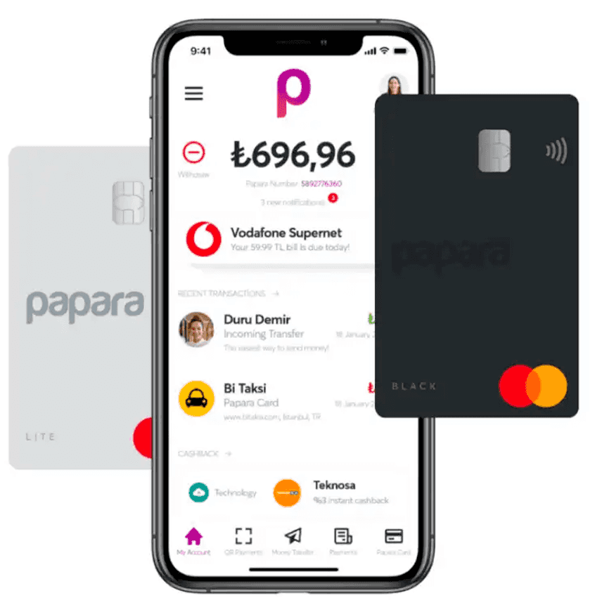 Smart phone showing Papara mobile app; Papara bank cards on either side
